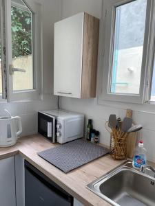 Appartements Le Bleu Cobalt - Proche IFMK & Cavilam & Gare : photos des chambres