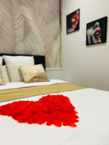 Appartements Suite Cosy Jacuzzi Troyes - Secrets d'Ana : photos des chambres