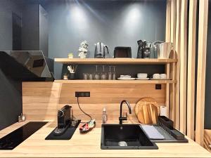 Appartements Suite Cosy Jacuzzi Troyes - Secrets d'Ana : photos des chambres