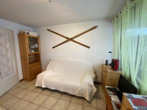 Appartements Studio cosy pour 4 pers., expo Sud, pres des pistes et commerces, avec balcon et equipements complets - FR-1-733-151 : photos des chambres