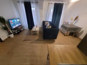 Coquet appartement à 15mn de Paris et 10 mn de Stade de France, wifi, Netflix,