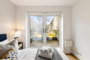 Tranquil Flat with Outdoor Space - Prime Location!