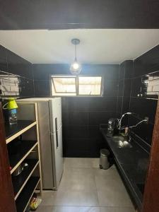 Quarto e sala São Mateus.