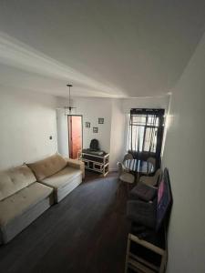 Quarto e sala São Mateus.