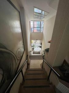 Quarto e sala São Mateus.