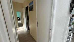 Appartement EST classé 3 étoiles au 1er étage dune maison avec jardin dans un quartier calme