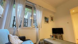 Cozy apartment ideally located city center and Megaron Moussikis metro station