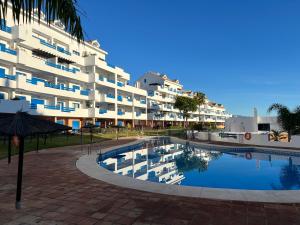 2 bedrooms sea and pool view apt in Duquesa Golf & Gardens Manilva