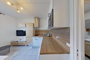 Appartements Studio Cosy proche Gare de Poissy RER A : photos des chambres