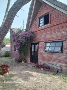 Confortable y acogedora cabaña a 150 mts de la playa - 凯博波洛尼奥