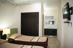 Suites del Sol Hotel & Apartments