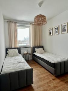 Apartament Przytuly 4, self check in, parking, blisko lotniska