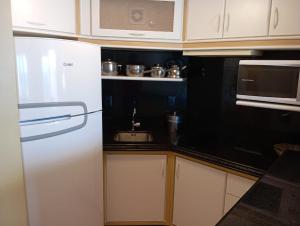 Cobertura aparthotel frente ao mar