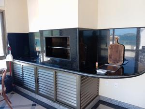 Cobertura aparthotel frente ao mar