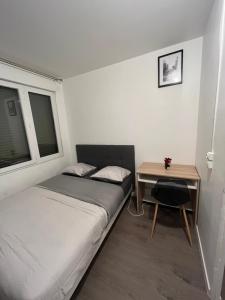 Sejours chez l'habitant Chambre cosy dans appartement neuf tout equipe : photos des chambres