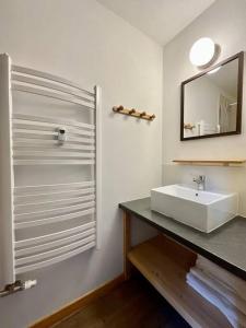 Appartements Le Grand Loup, appartement neuf avec bain nordique : photos des chambres