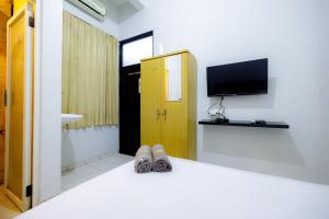 Marcello Residence Siwalankerto near Petra University Surabaya Mitra RedDoorz
