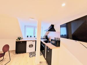 Appartements L'elementaire, appartement chic et central : photos des chambres