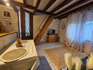 Appartements Triplex Proche Charles De Gaulle : photos des chambres