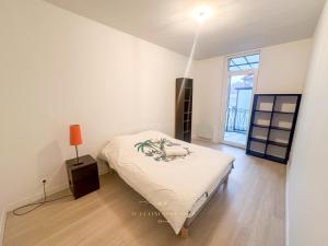 Appartements Le Grand Rambolitain : photos des chambres