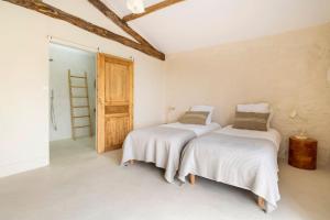 Villas Magnifique maison ancienne avec piscine et vue : photos des chambres