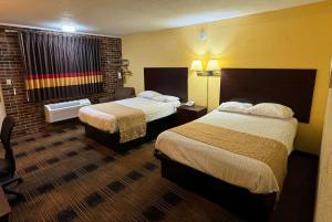 Deluxe Double Room with Two Double Beds - Non-Smoking room in Travelodge by Wyndham Airport Platte City