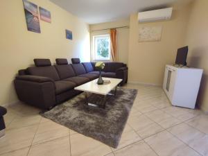 Apartman s vrtom u blizini centra