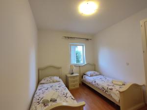 Apartman s vrtom u blizini centra