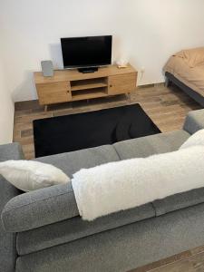 Studio bien situé & tout équipé dans une maison