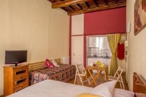 Quadruple Room with Kitchenette room in Bollo Apartments