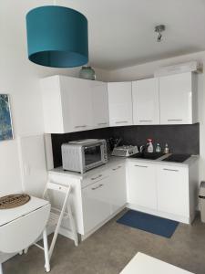 Maisons de vacances Dormez au coeur du village entre plage et polder : photos des chambres