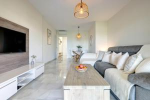 La Cala gorgeous 2 bedroom apartment with stunning gardens, pools and sea views