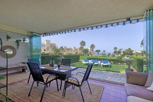 La Cala gorgeous 2 bedroom apartment with stunning gardens, pools and sea views