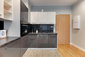 Sara - Studio Wałowa by Grand Apartments