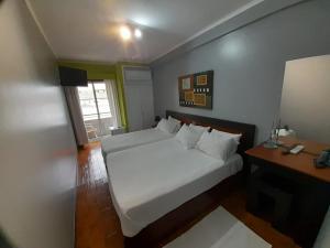 Triple Room room in Hotel Dom Joao IV
