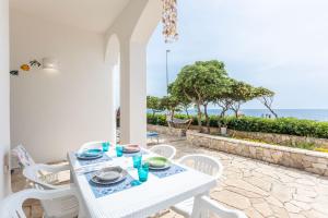 Villetta Fonni fronte mare - Apulia Home