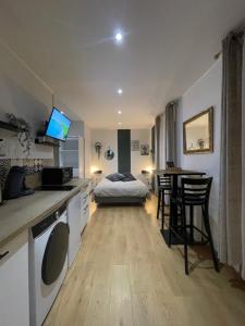 Appartements Velours & Balneo : photos des chambres