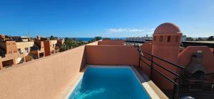 Homes of Spain, Apartamentos Paraiso Vera Playa, Ed Tahiti, Atico H de 2 dormitorios con piscina privada en solárium y barbacoa, pie de playa, WIFI