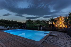 Appartements Mas Des Fleurs - GPV : photos des chambres