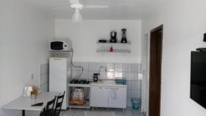 N 05 - Apto com 1 quarto 2 camas solteiro com ar condicionado e garagem