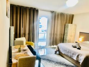 Appartements Happy studio 64 St louis : photos des chambres