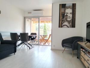 Appartements Appartement central avec parking, terrasse et WIFI : photos des chambres
