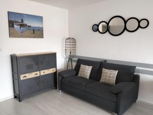 Appartements Appartement central avec parking, terrasse et WIFI : photos des chambres