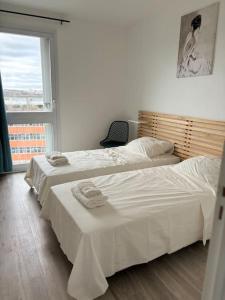 Appartements L'Orlysia - Proche Paris et centre-ville : photos des chambres