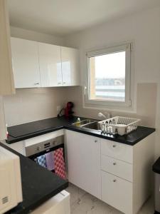 Appartements L'Orlysia - Proche Paris et centre-ville : photos des chambres