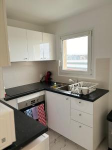 Appartements L'Orlysia - Proche Paris et centre-ville : photos des chambres