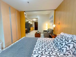 1 BR Uptown BGC Cozy Condo Netflix 200Mb Wi-Fi