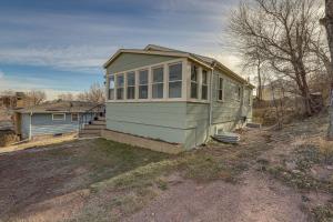Central Rapid City Home with Sunroom and Fireplace!