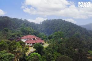 StayVista at Mercara Hill with Indoor-Outdoor Games - Huvilat, Madikeri