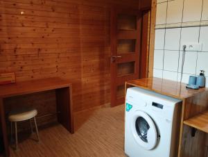 Apartmán v dřevěném domě